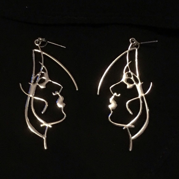 Sleek and sexy woman’s profile earrings. - Picture 2 of 4
